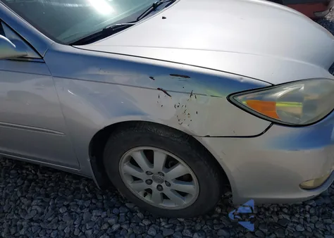 2004 Toyota Camry Xle z USA, uszkodzony, nr VIN 4T1BE32K54U895375